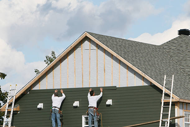 Professional Vinyl Siding technician working in Louviers, CO
